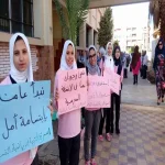 "بالصور" طالبات "السادات الثانوية" بالعاشر يستقبلن زميلاتهن الجدد بالحلوى 