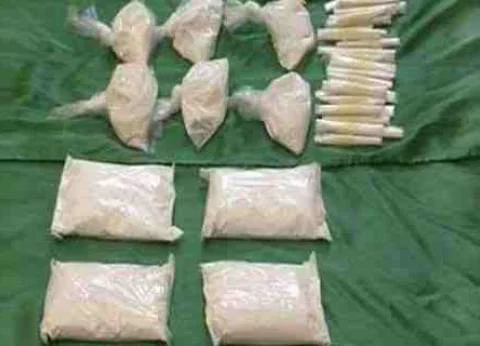 ضبط عامل بحوزته بندقية و31 تذكرة هيروين قبل ترويجها بالحسينية